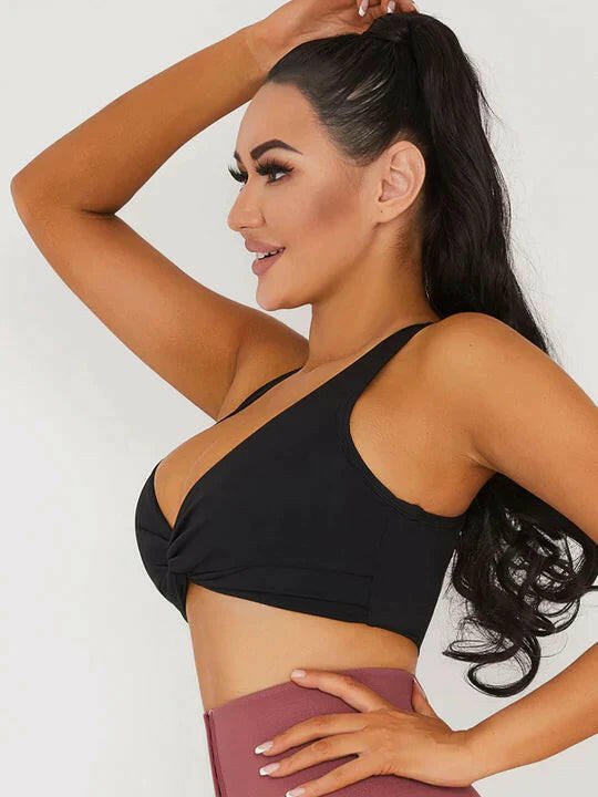 Khaki V-neck sports bra by Lumina Vancouver, designed for comfortable support during athletic activities.