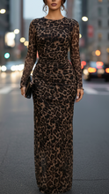 Valentina Lumina leopard print fitted maxi dress in brown, showcasing a sleek silhouette and stylish design.