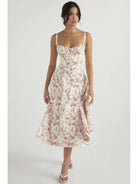 Venura Spring Dress by Lumina Vancouver, white floral print wedding guest dress in size XS for women.