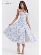 Venura spring wedding guest dress by Lumina Vancouver, white floral print, sleeveless, perfect for spring wedding occasions.