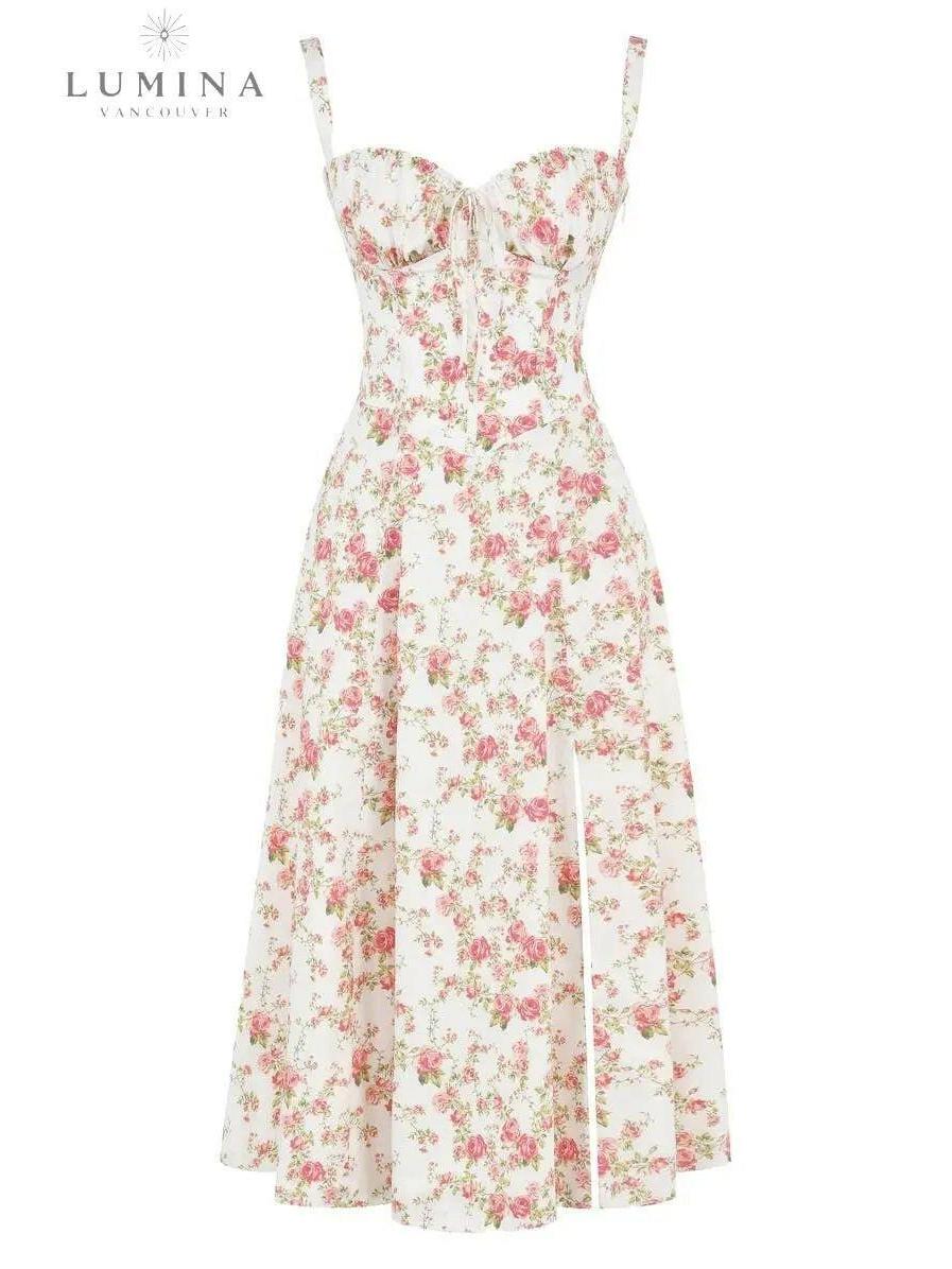 White Venura spring wedding guest dress by Lumina Vancouver featuring a floral print, perfect for elegant occasions.