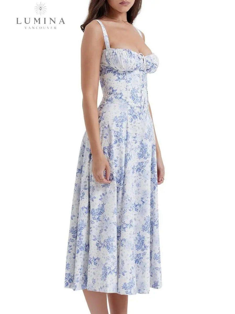White Venura spring wedding guest dress by Lumina Vancouver with floral print, perfect for spring and summer occasions.