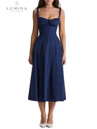 White Venura spring dress with floral print, perfect for wedding guests, by Lumina Vancouver.
