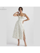 Venura spring wedding guest dress by Lumina Vancouver, white floral print, sleeveless, size 6-8, perfect for outdoor spring weddings.