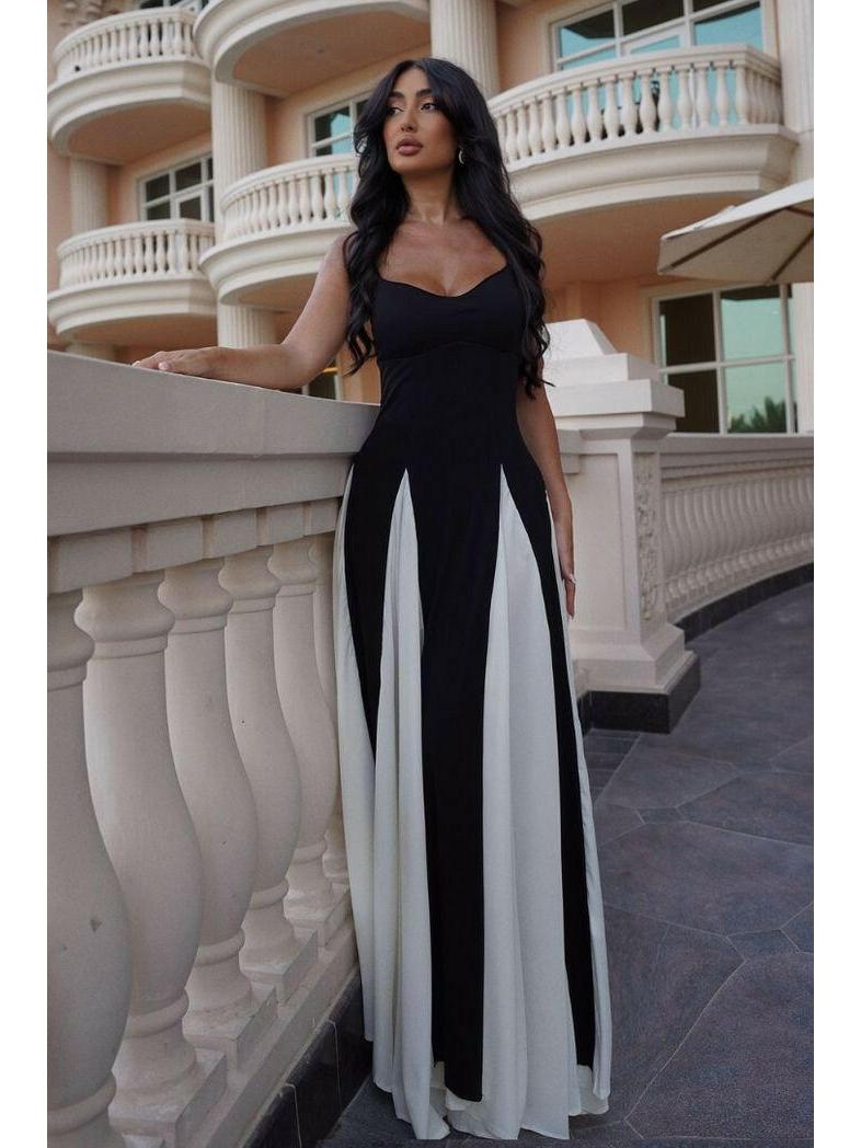 Black and white Viara paneled maxi dress by Lumina Vancouver displayed on a model, showcasing a flowing, elegant design.