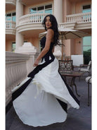 Black and white Viara paneled maxi dress by Lumina Vancouver, featuring a flowing silhouette and stylish panel details.