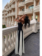 Black and white Viara paneled maxi dress by Lumina Vancouver, featuring flowing fabric and elegant design.