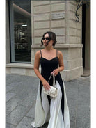 Black and white Viara paneled maxi dress by Lumina Vancouver, featuring a flowing silhouette and stylish panel design.