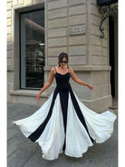 Black and white Viara paneled maxi dress by Lumina Vancouver, featuring a flowing silhouette and stylish design.