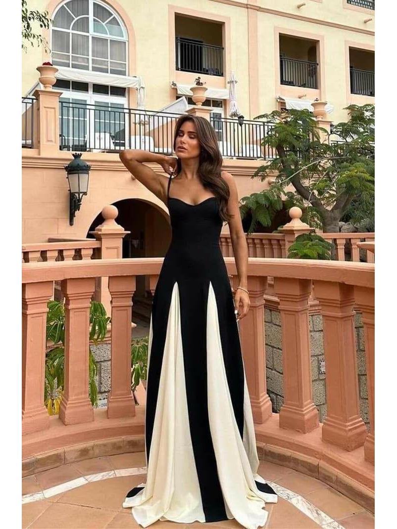 Black and white Viara paneled maxi dress by Lumina Vancouver, featuring a flowing silhouette and stylish panel design.
