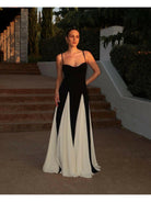Black and white Viara paneled maxi dress by Lumina Vancouver, featuring a flowing silhouette and stylish design.