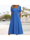 Green Vicky casual elegance midi dress by Lumina Wear, featuring a fitted waist and flowing skirt for a sophisticated look.