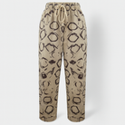 Lumina Wear Victor beige relaxed trousers with elastic waistband and circle print, casual pants for comfortable everyday wear.