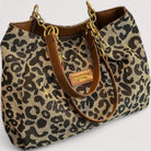 Victoria bold leopard print canvas shopping bag by Lumina Wear, stylish and spacious handbag with a vibrant animal pattern.