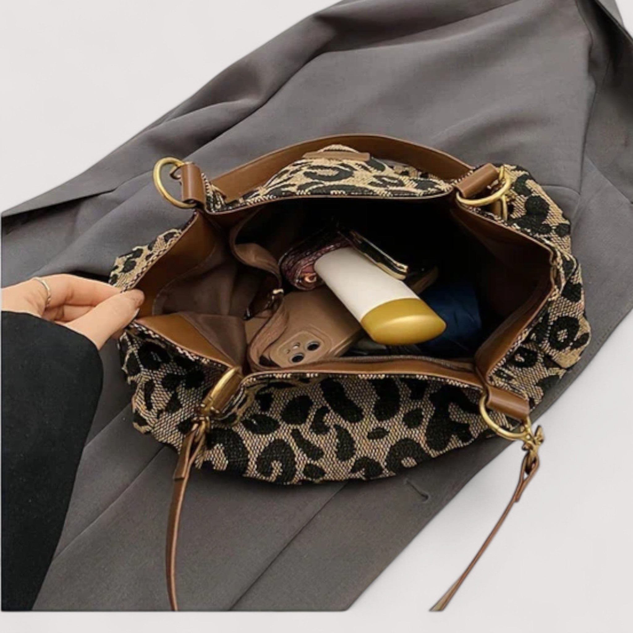 Lumina Wear Victoria leopard print canvas shopping bag with sturdy handles and bold animal pattern for fashionable everyday use.
