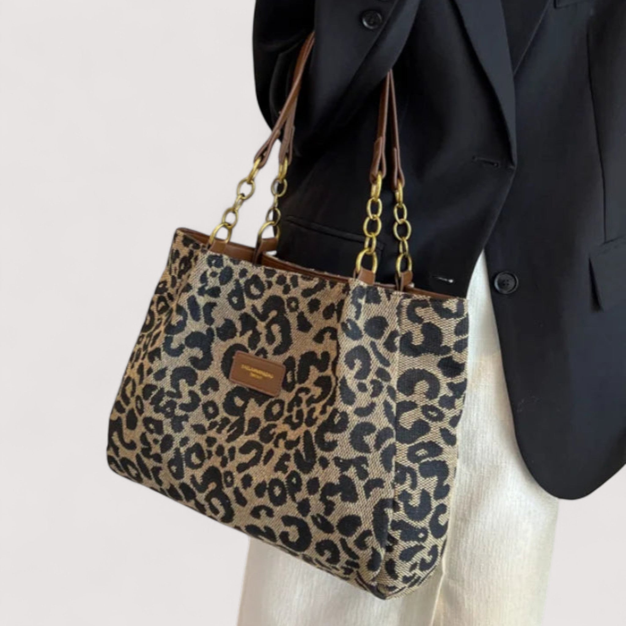 Victoria bold leopard print canvas shopping bag by Lumina Wear, featuring spacious design and sturdy handles.