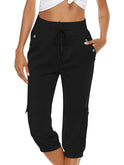 Light green breathable Capri trousers with elastic waist from Lumina Wear, designed for comfortable women's casual wear.