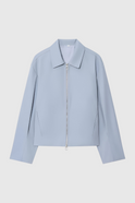 Light blue Victoria casual bomber jacket with zipper closure by Lumina Wear, featuring a relaxed fit and stylish design.