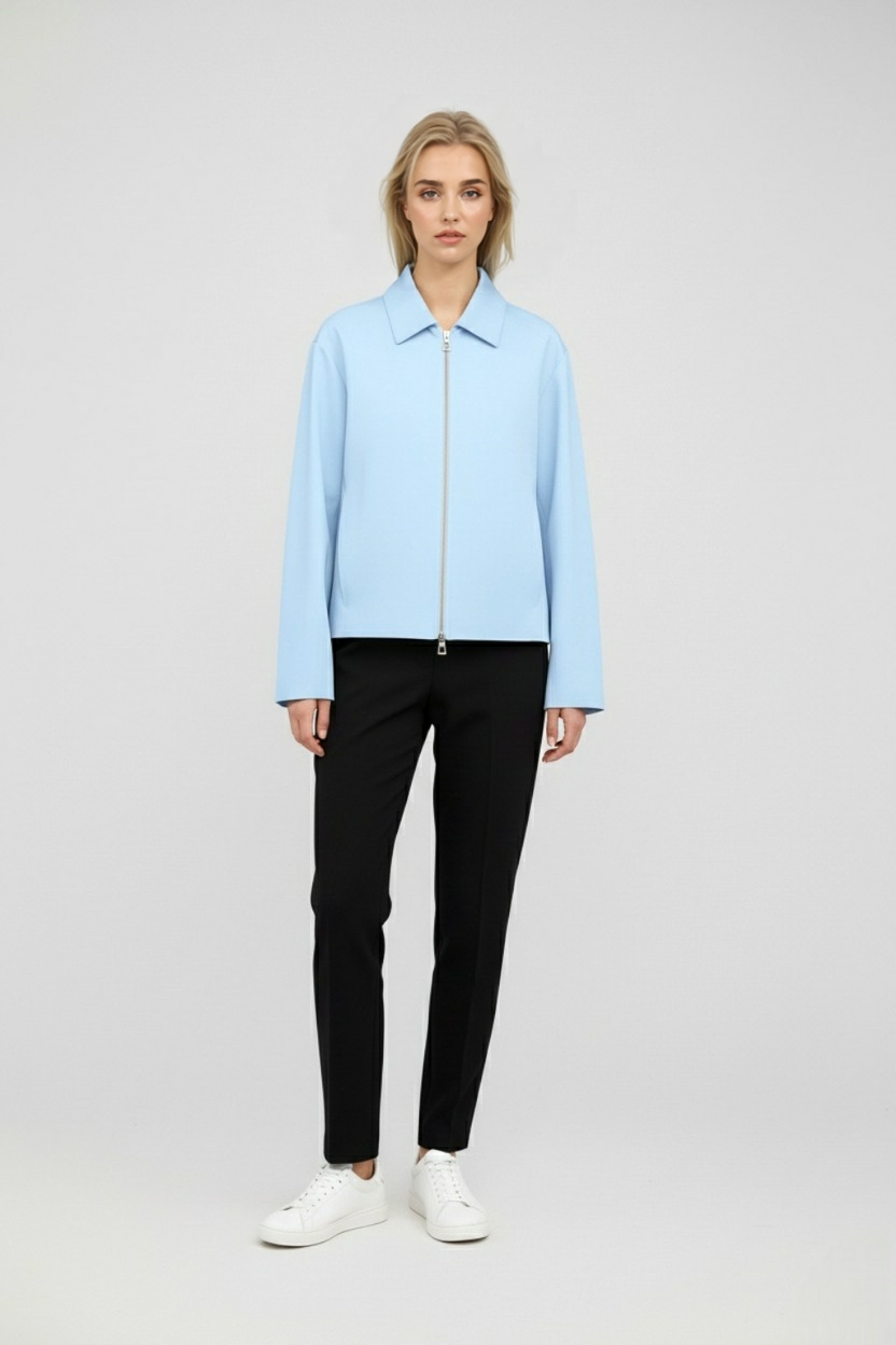 Light blue Victoria Lumina Wear casual bomber jacket with zipper closure, shown on a model with a relaxed fit and modern style.