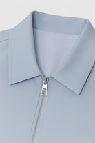 Light blue Victoria Lumina Wear casual bomber jacket with zipper closure, shown on a mannequin.