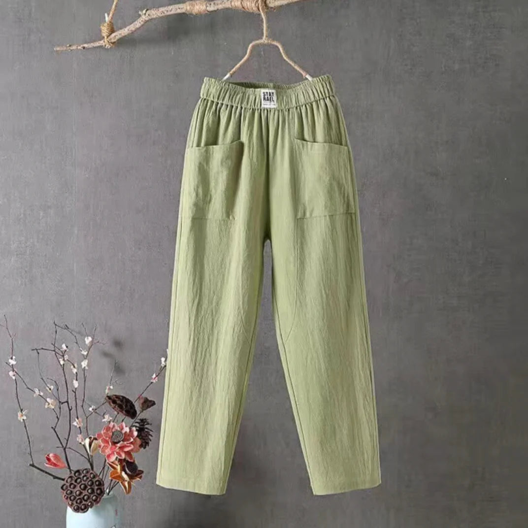 Victoria Lumina white casual trousers with elastic waistband, featuring a relaxed fit and lightweight fabric for comfortable wear.