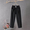 Victoria casual white trousers with elastic waistband from Lumina Wear, featuring a relaxed fit and comfortable design.