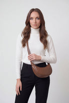 Lumina Wear Victoria black adjustable belt handbag with multiple pockets, stylish and functional for everyday use.