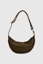 Lumina Wear Victoria chic adjustable belt handbag with multiple pockets in black, stylish and functional for everyday use.