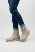 Beige Victoria ankle boots by Lumina Wear with durable sole, stylish design, and ankle-high cut, shown from a side angle.