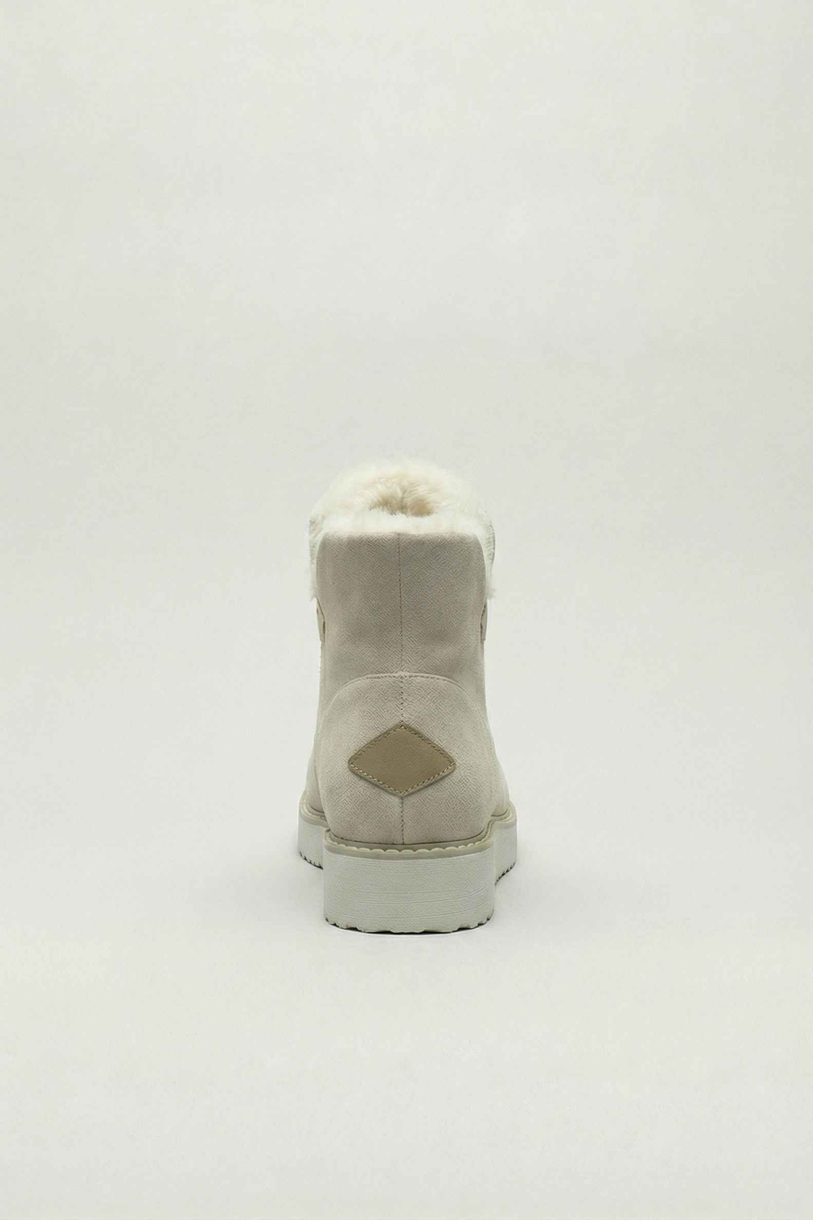 Beige Victoria ankle boots by Lumina Wear with durable sole, close-up view showing stylish design and ankle height.