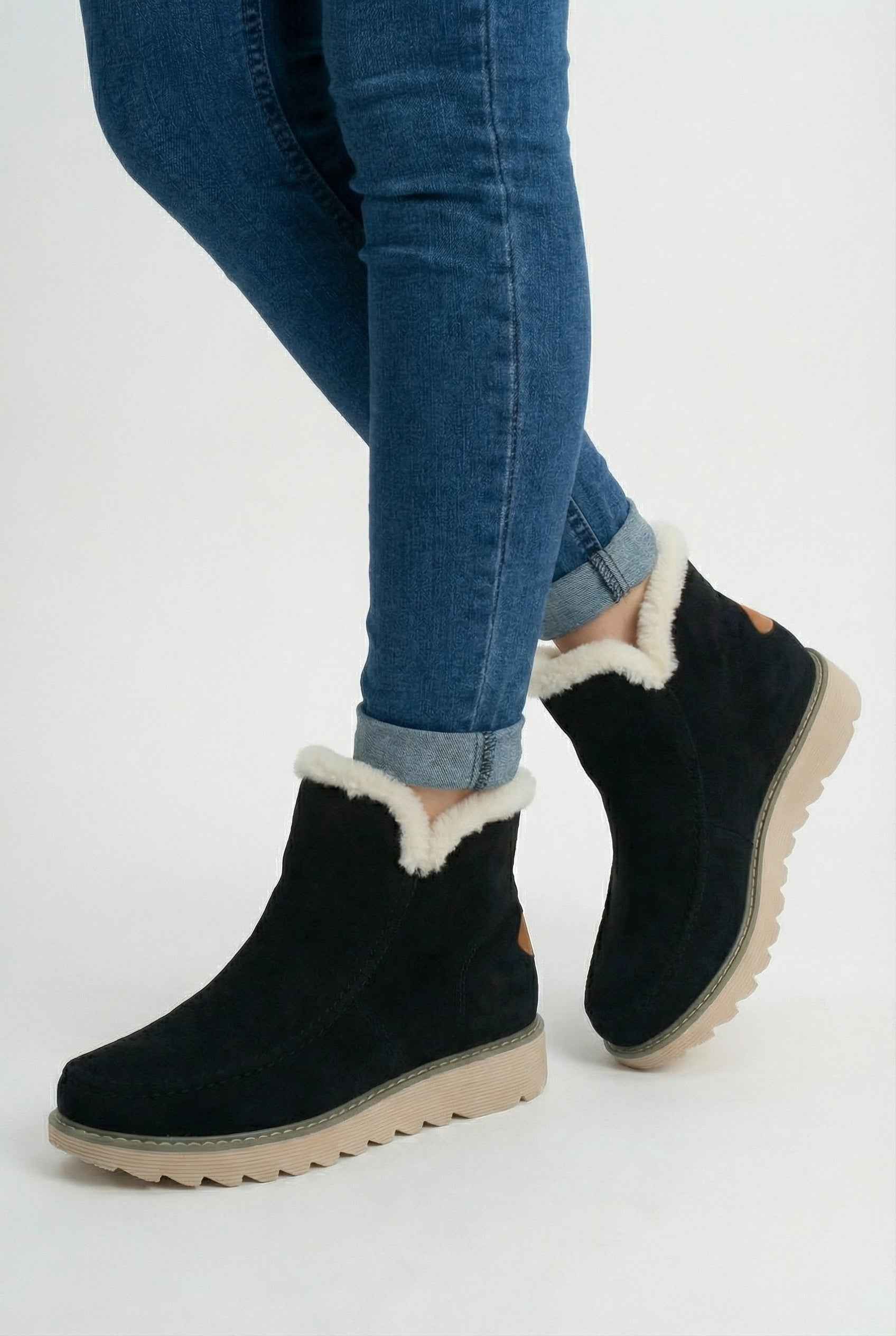 Black Victoria Lumina Wear ankle boots with warm lining, stylish design, and ankle-high silhouette in size 36.