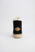 Black Victoria Lumina Wear ankle boots with chic design, warm lining, and stylish ankle height. Perfect for cold weather.