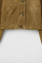 Victoria black button jacket by Lumina Wear, featuring breathable fabric and a stylish chic design.