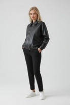 Victoria black leather jacket with retro collar by Lumina Wear, stylish women's jacket featuring smooth leather and classic design.