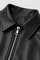 Victoria black leather jacket with retro collar from Lumina Wear, stylish and fitted, featuring classic design and sleek details.