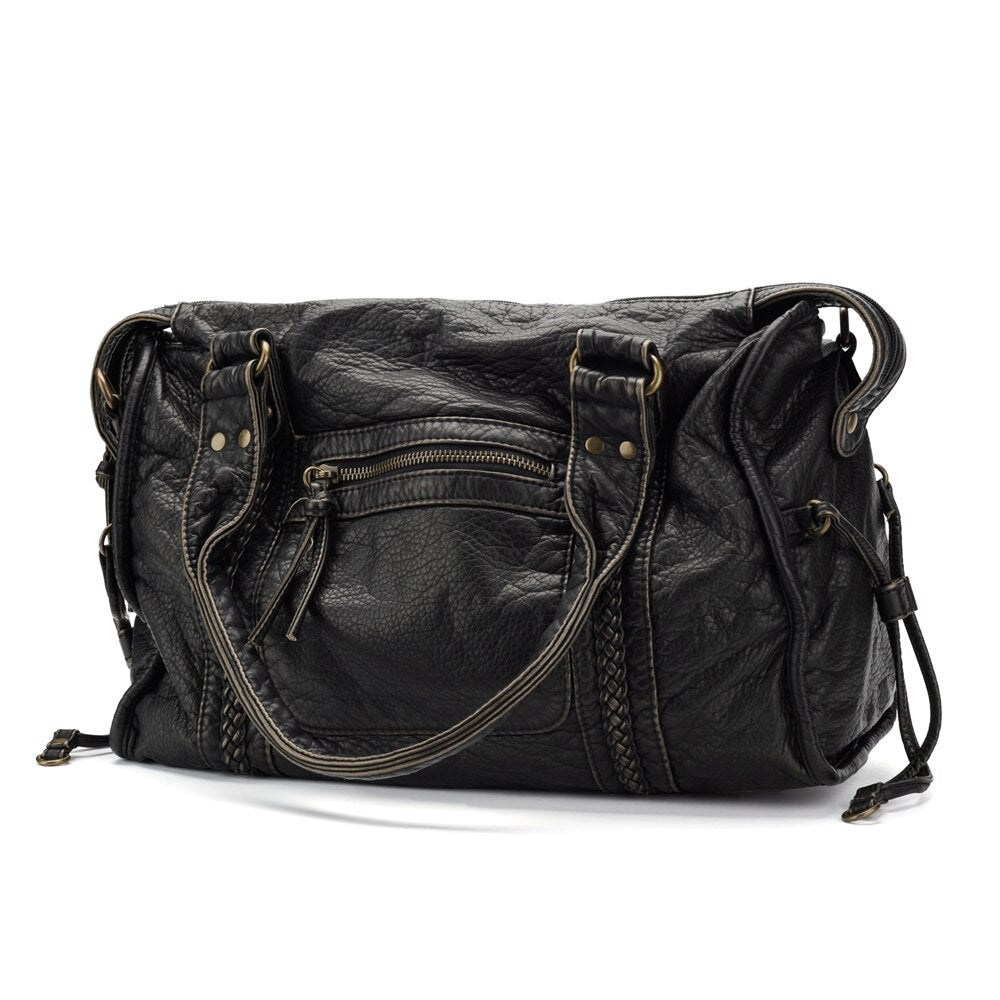 Lumina Wear Victoria chic black PU leather handbag with multiple pockets and sleek design, perfect for everyday style.