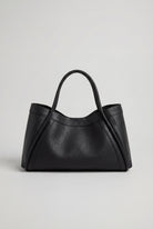 Lumina Wear Victoria black tote bag with spacious pockets, stylish design, and sturdy handles, perfect for everyday use.