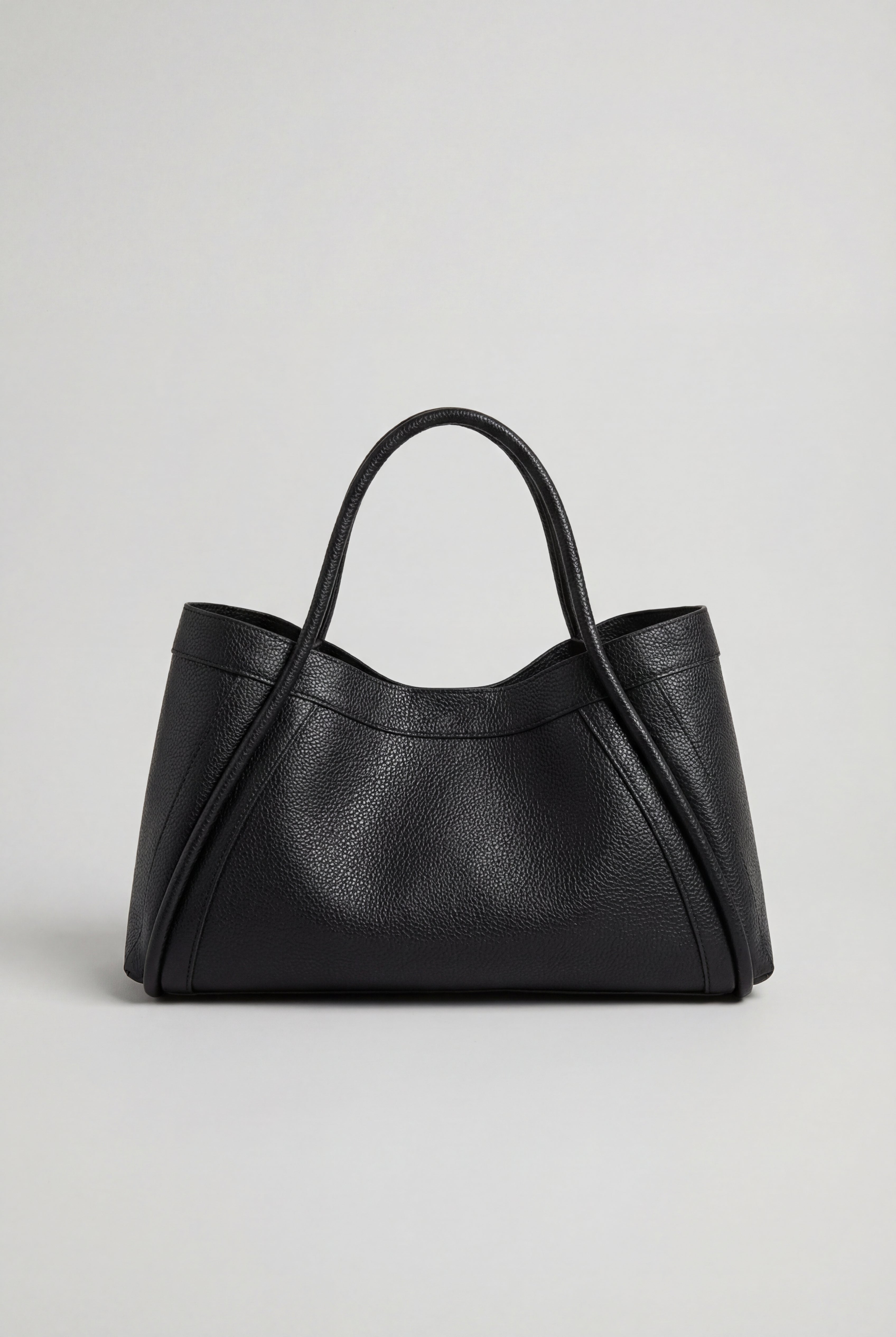 Lumina Wear Victoria black tote bag with spacious pockets, stylish design, and sturdy handles, perfect for everyday use.
