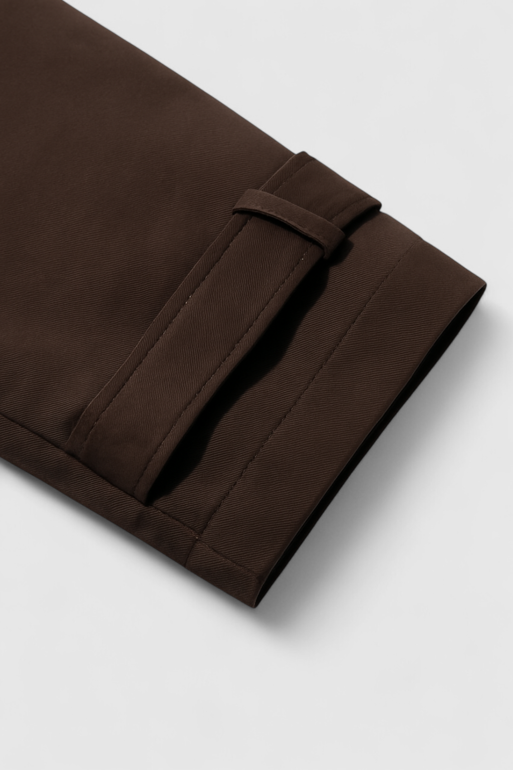Victoria brown windbreaker jacket by Lumina Wear featuring a double-breasted design, stylish and lightweight for casual wear.
