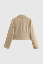 Khaki Victoria Lumina Wear cropped button jacket with flattering fit, shown on a model, stylish and lightweight for casual wear.