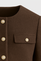 Dark brown Victoria women's short jacket by Lumina Wear featuring a chic, tailored fit and stylish design.