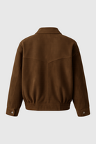 Victoria dark brown suede bomber jacket by Lumina Wear with zipper closure, shown on a model, featuring a stylish and sleek design.