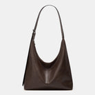 Victoria Lumina commuter tote bag in brown with durable construction and ample storage for handbags and purses.