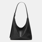 Lumina Wear Victoria commuter tote bag in brown, featuring durable construction and spacious interior for everyday use.