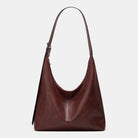 Lumina Wear Victoria commuter tote bag in brown with durable design and ample storage for everyday use.