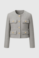 Victoria Lumina gray short jacket with versatile style, featuring a chic design and lightweight fabric, perfect for casual wear.