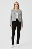 Victoria Lumina gray short jacket with versatile style, featuring a chic design and lightweight fabric, perfect for casual wear.