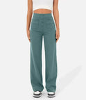 Victoria high-waisted trousers by Lumina Wear in stone green with stretch fabric, styled for a chic, tailored look.