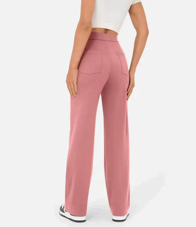 Victoria high-waisted trousers by Lumina Wear in stone green with stretch fabric, showcasing a stylish and comfortable fit.