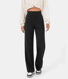 Victoria high-waisted trousers by Lumina Wear in stone green stretch fabric, featuring a chic, tailored fit.